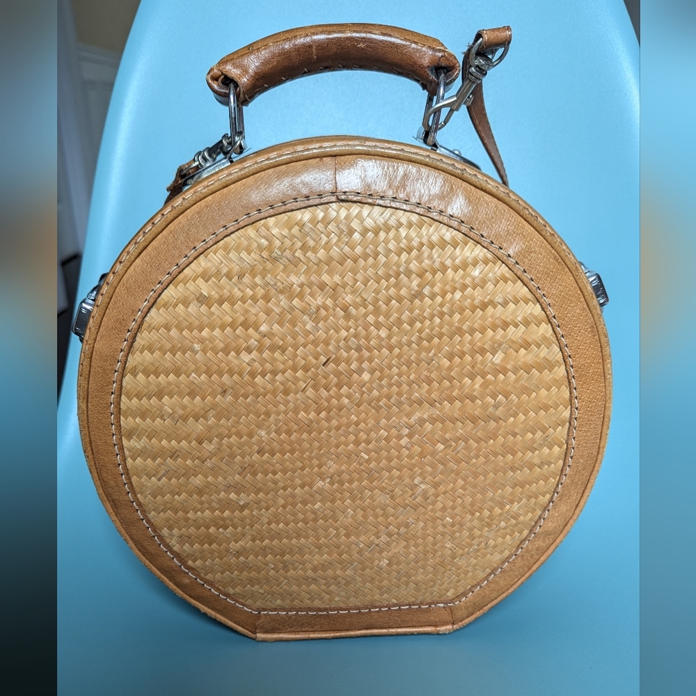 Bamboo handbag with strap.